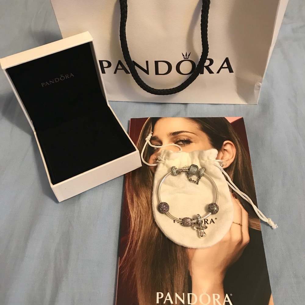 Brand new -Pandora charm braclet. Worn once!!!!